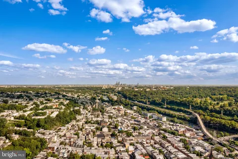 an aerial view of a house with a garden