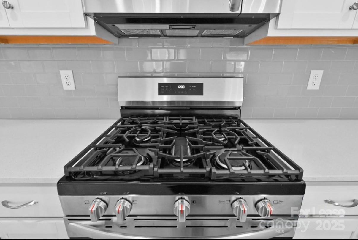 4326 Shimmering Stone Way Maiden, NC 28650 - Photo 12 of 27 a white stove top oven sitting inside of a kitchen