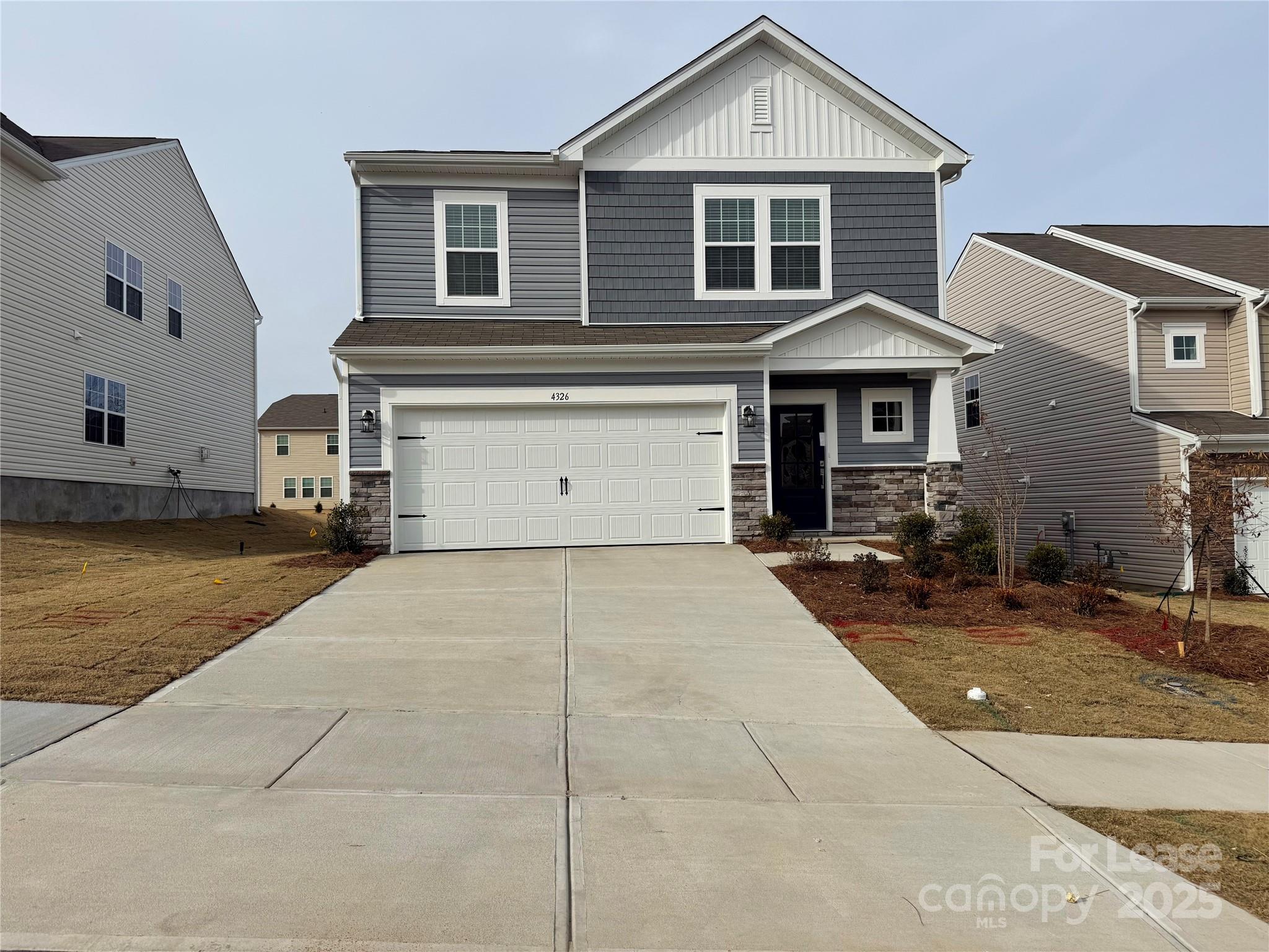 4326 Shimmering Stone Way Maiden, NC 28650 - Photo 2 of 27 a front view of a house with yard