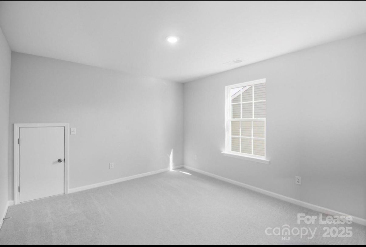 4326 Shimmering Stone Way Maiden, NC 28650 - Photo 22 of 27 an empty room with a window
