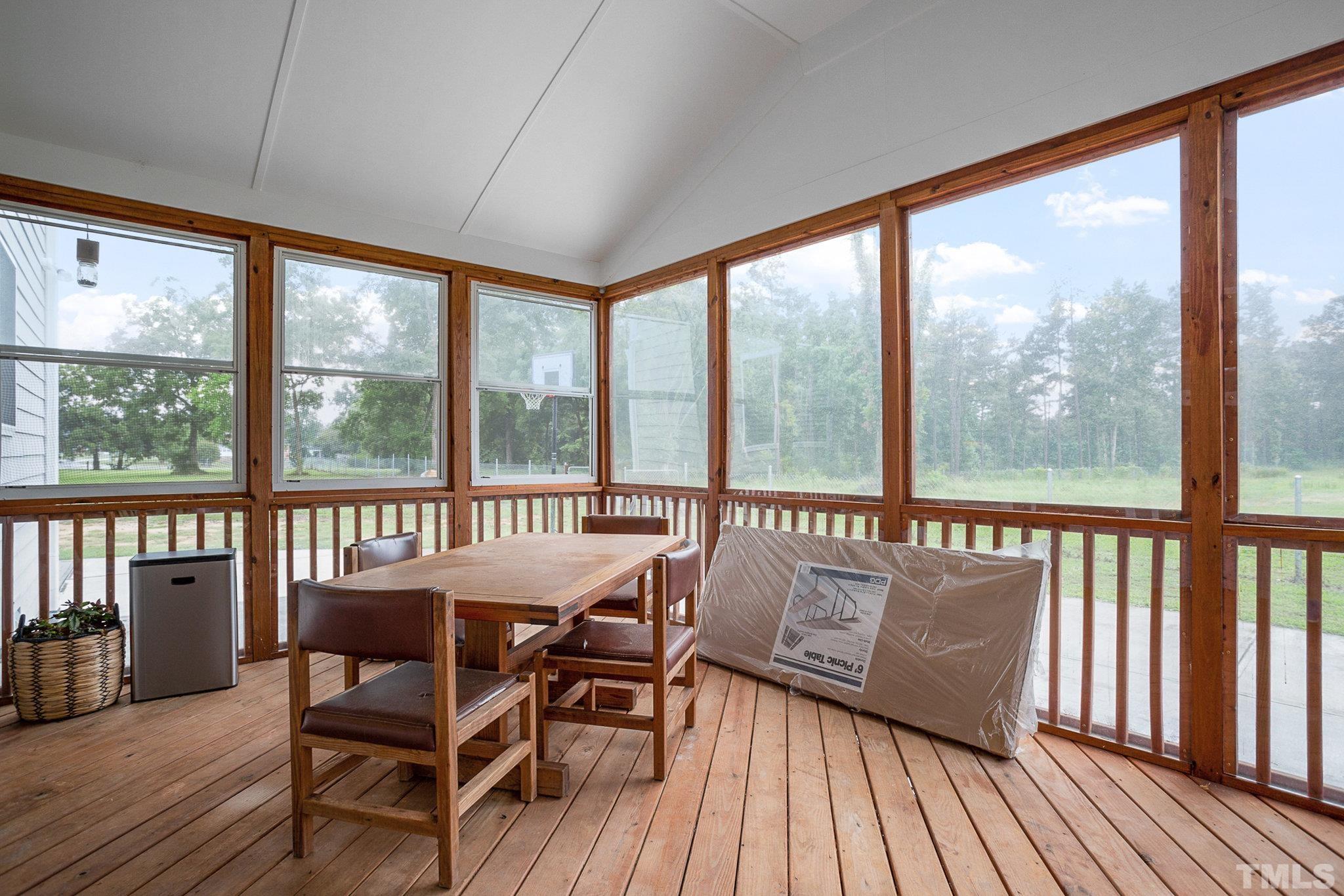 1214 Raleigh Street Oxford, NC 27565 - Photo 37 of 40 a view of a city from a balcony with furniture