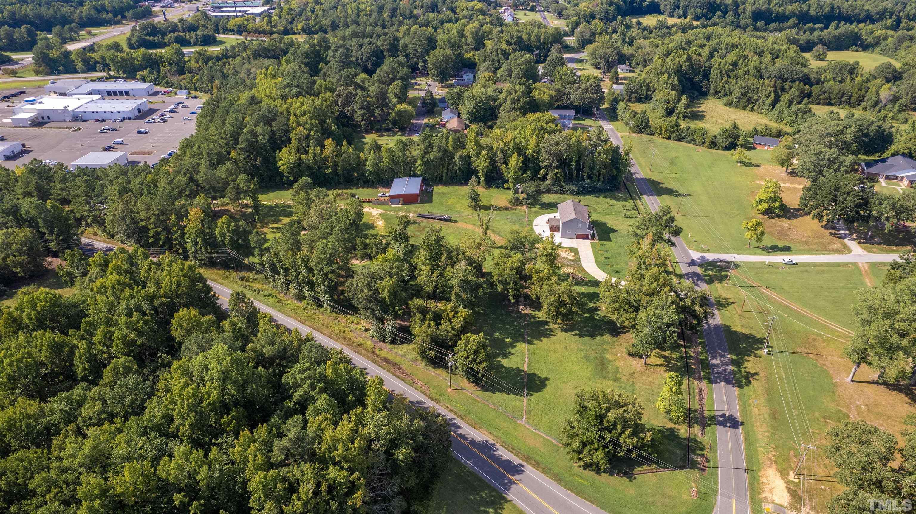 1214 Raleigh Street Oxford, NC 27565 - Photo 39 of 40 an aerial view of residential houses with outdoor space
