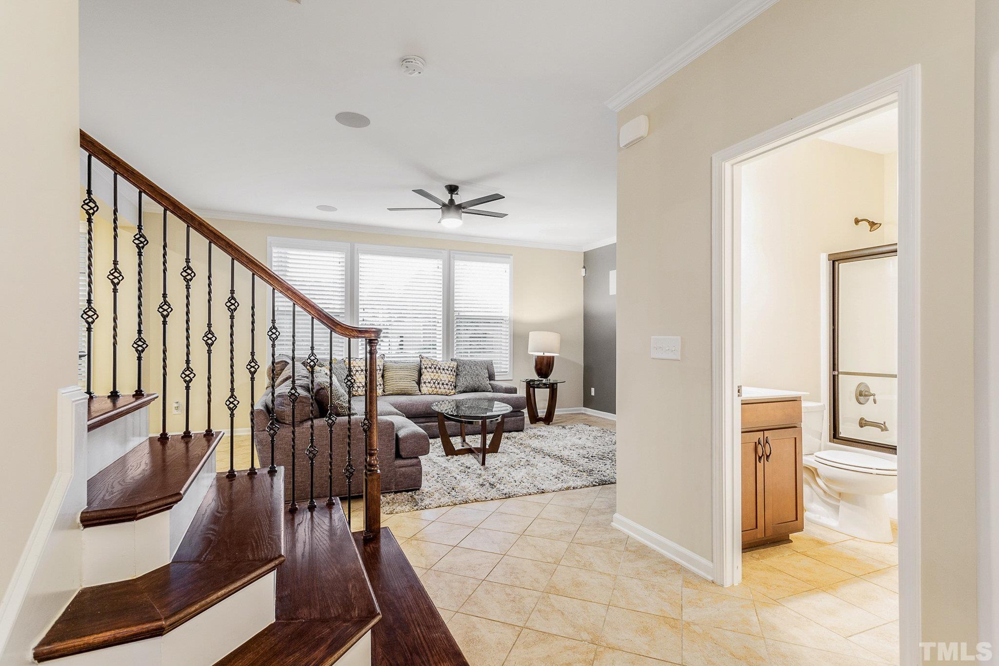 1214 Raleigh Street Oxford, NC 27565 - Photo 10 of 40 a view of a livingroom with furniture and stairs