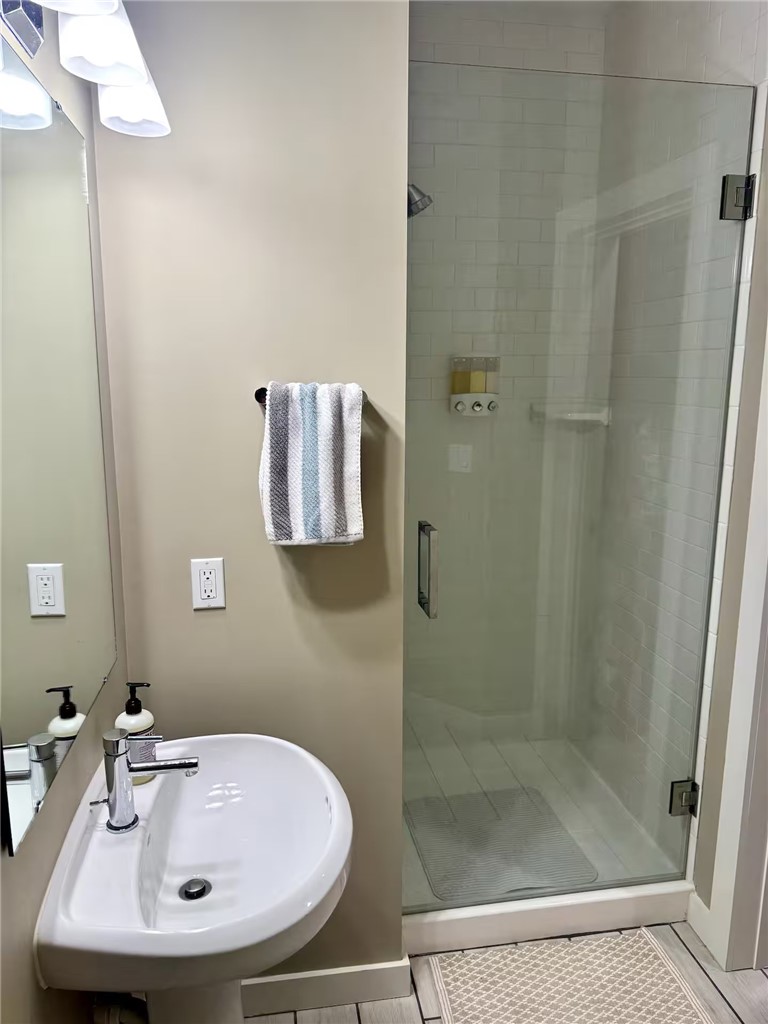 14310 Ridley Way Corpus Christi, TX 78418 - Photo 10 of 19 a bathroom with a sink and shower