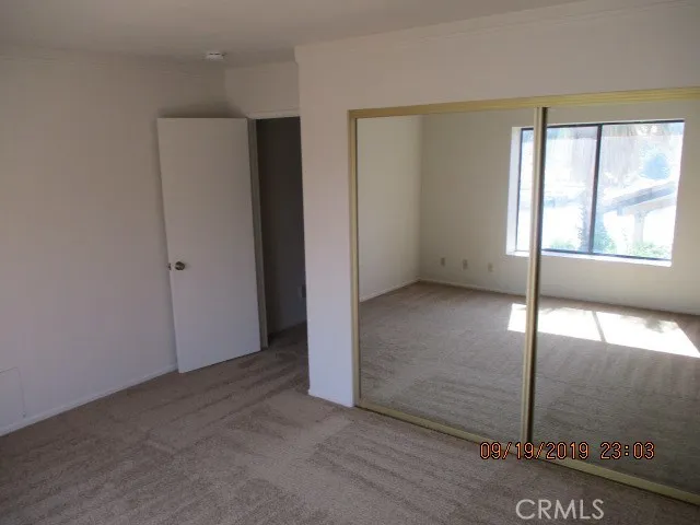 an empty room with sliding door