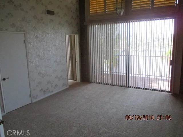 a view of a room with a window