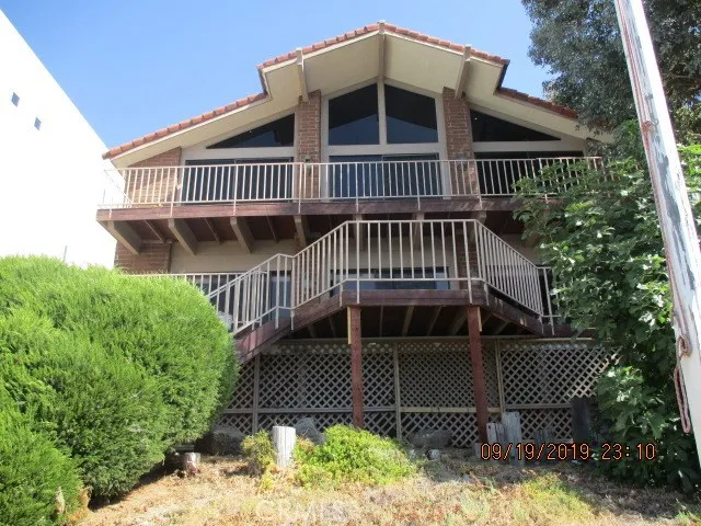 a view of a house with a deck