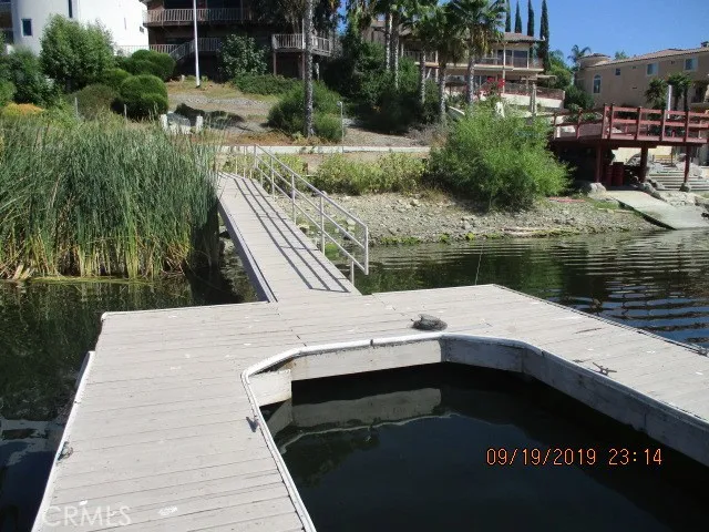 a view of balcony and yard