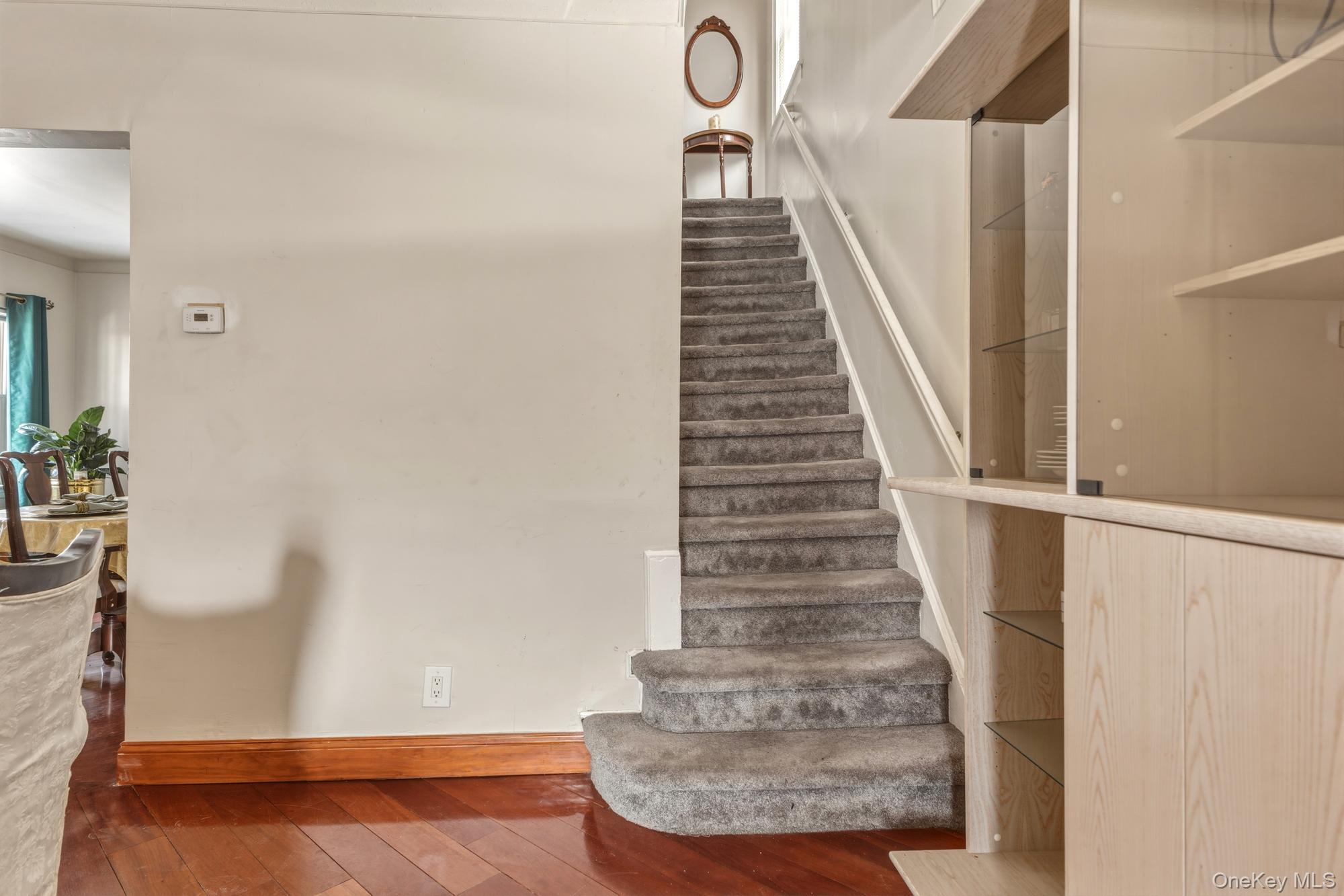 188-11 Dormans Road Queens, NY 11412 - Photo 20 of 32 a view of entryway and hall with wooden floor