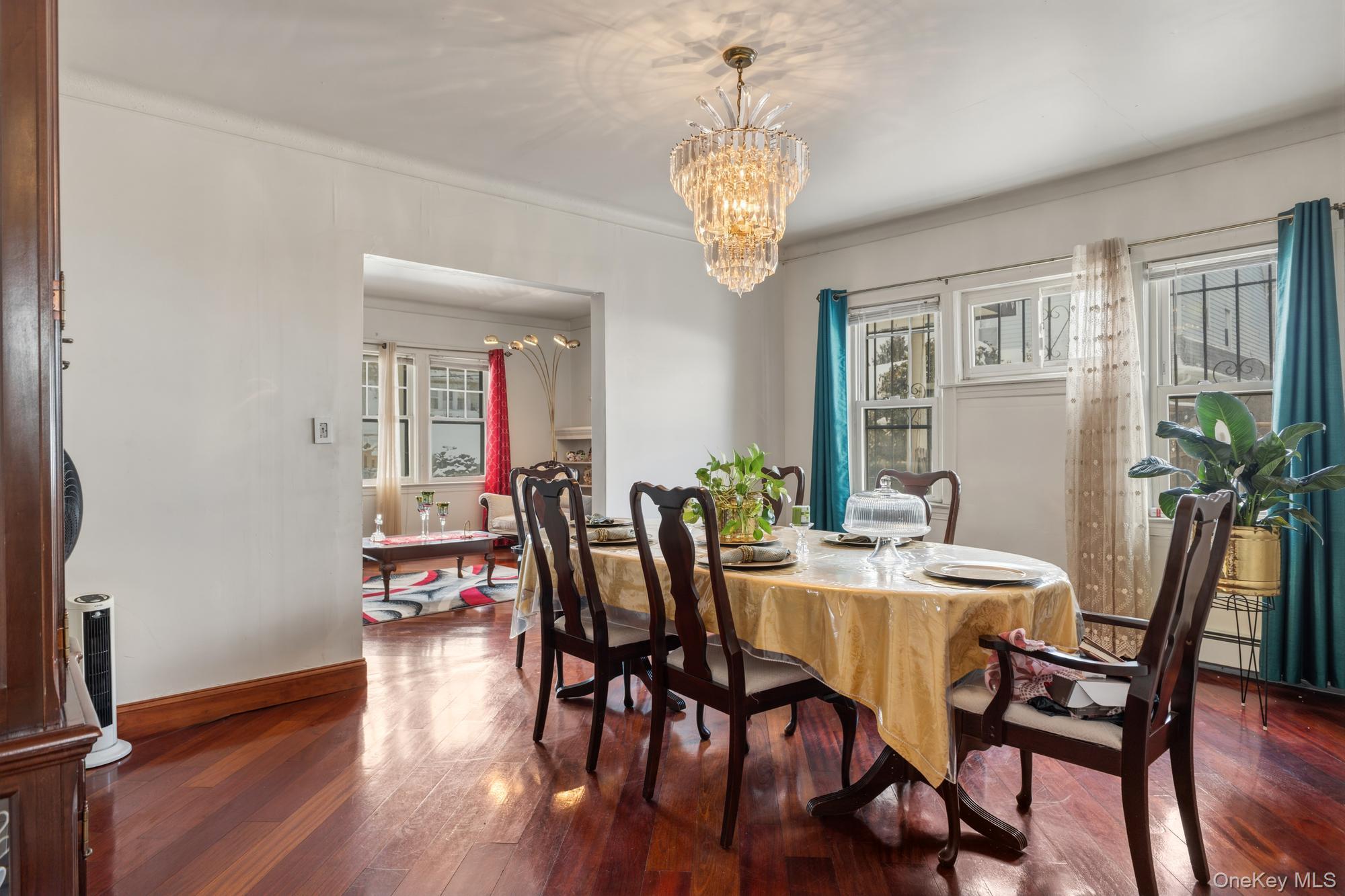 188-11 Dormans Road Queens, NY 11412 - Photo 7 of 32 a view of a dining room with furniture window and wooden floor