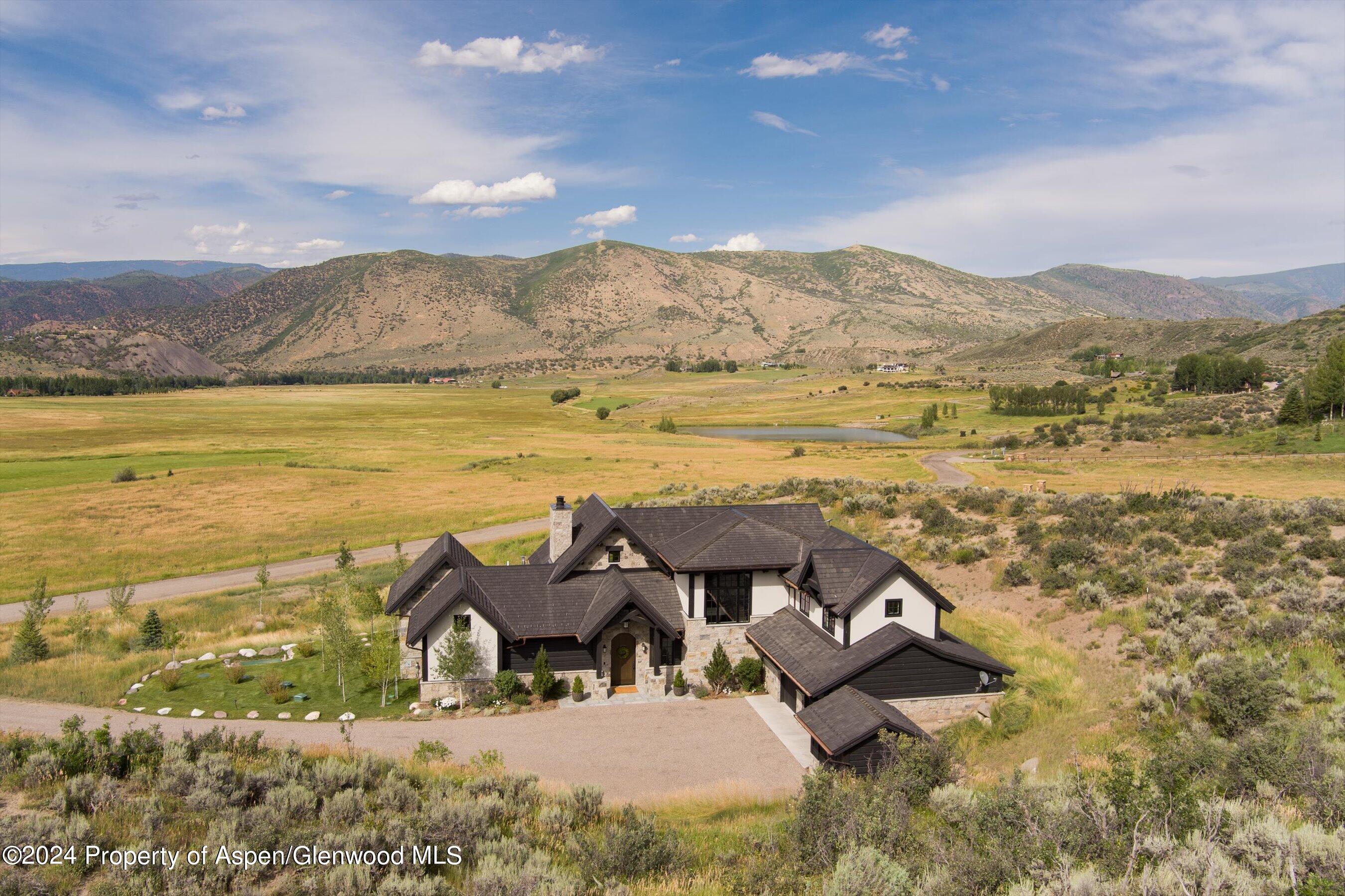 2388 Lazy O Road Snowmass, CO 81654 - Photo 44 of 65 a view of a lake with a mountain