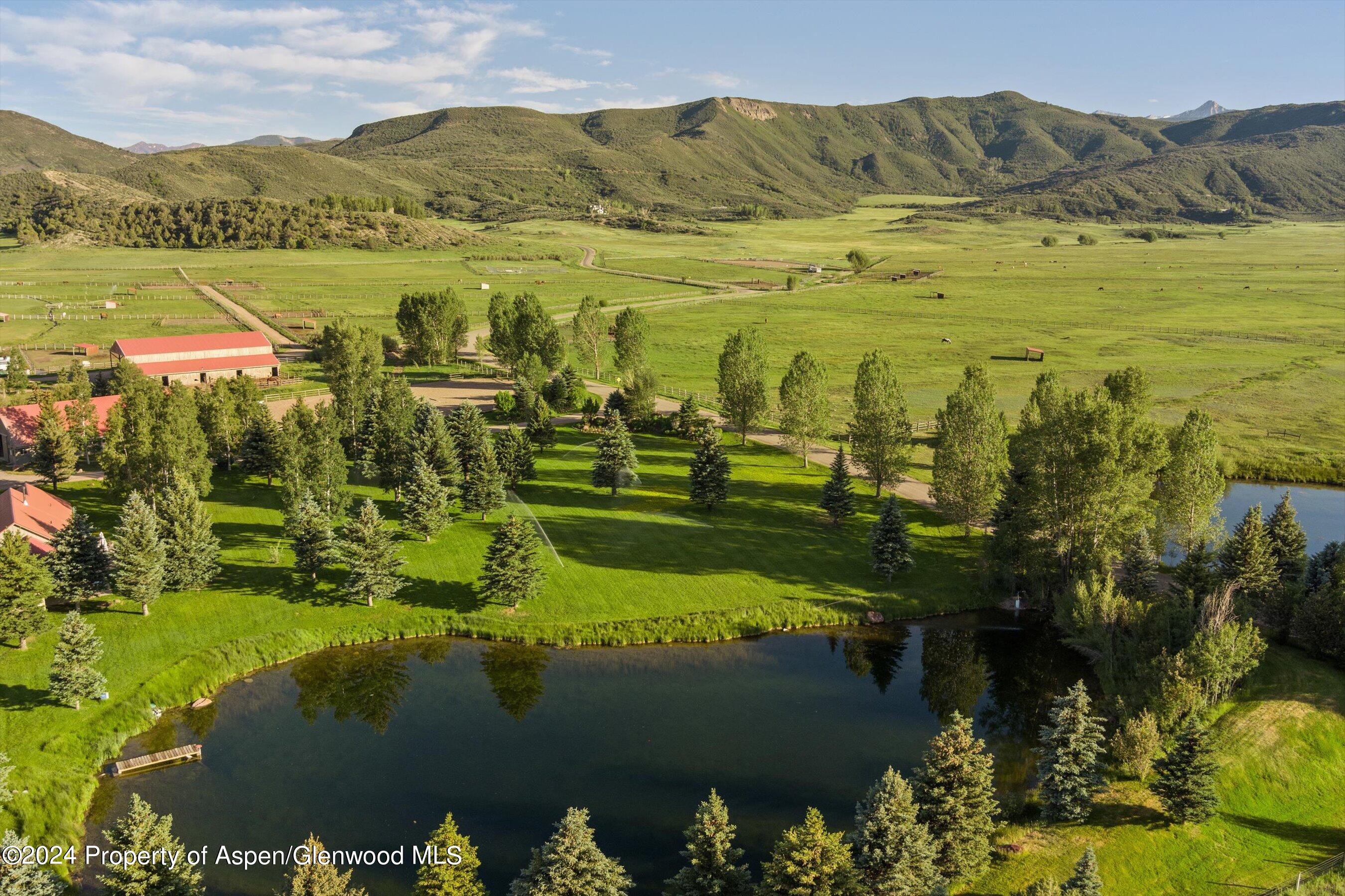 2388 Lazy O Road Snowmass, CO 81654 - Photo 57 of 65 a view of a lake with a mountain