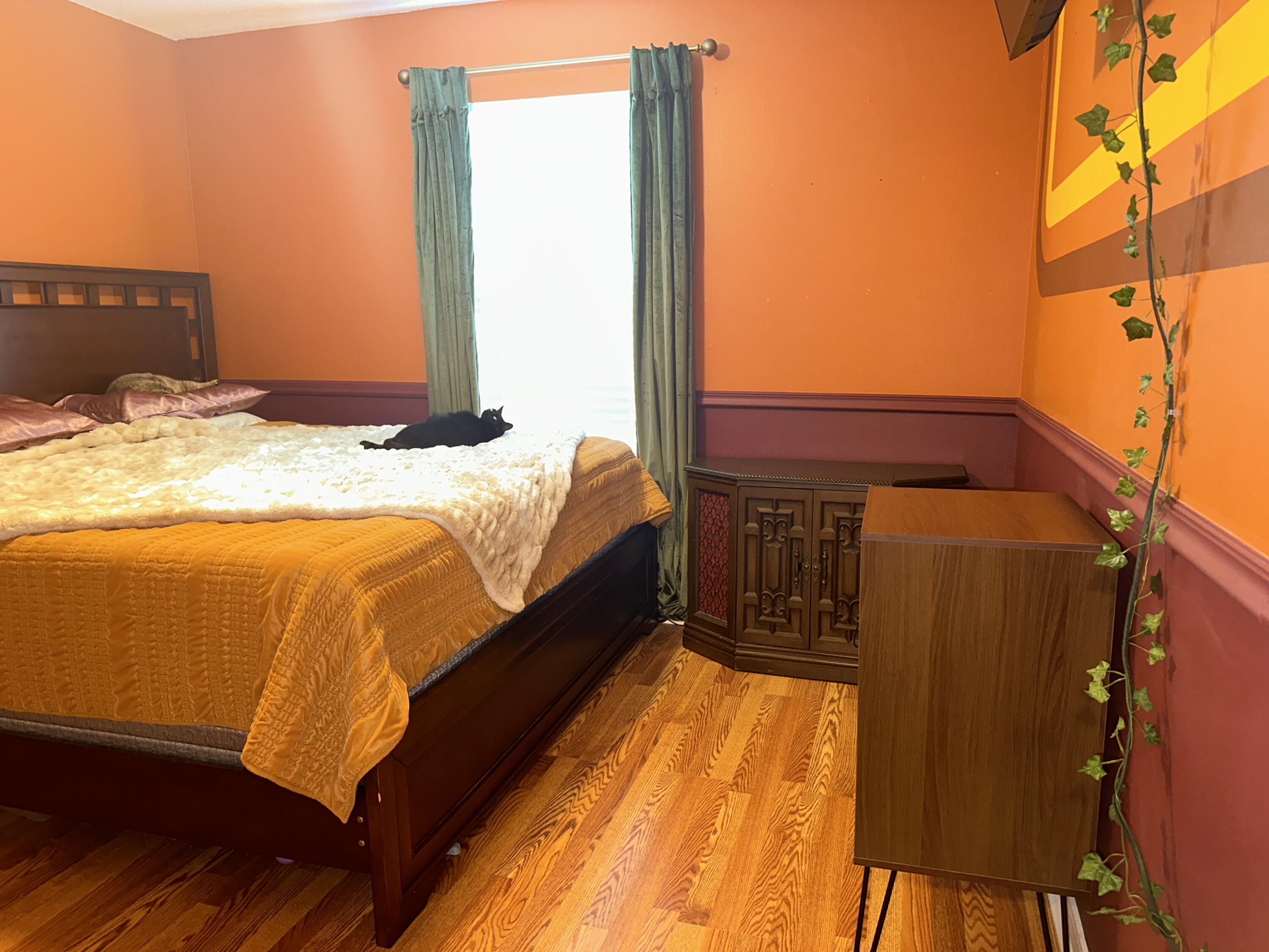 228 Trish Drive Crestview, FL 32536 - Photo 11 of 34 a bed sitting in a bedroom next to a window