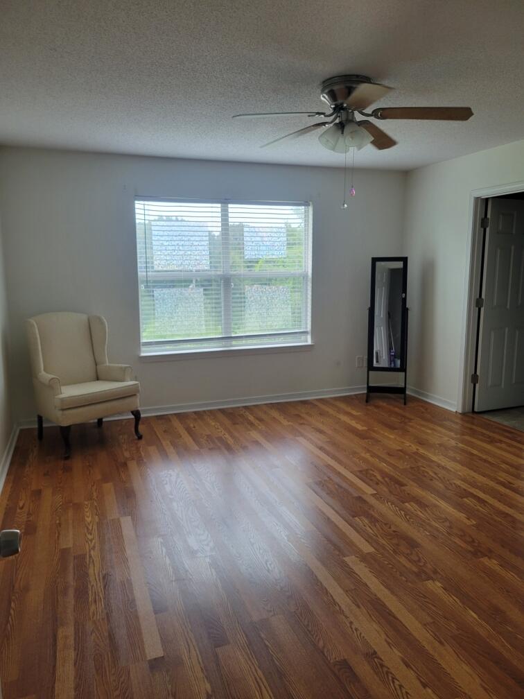228 Trish Drive Crestview, FL 32536 - Photo 22 of 34 wooden floor and windows in a room