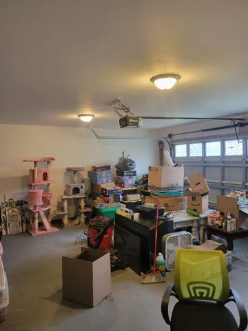 a room with lots of furniture and clutter