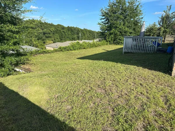 a view of a garden with an outdoor space