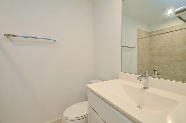 a view of storage and utility room with washer and dryer