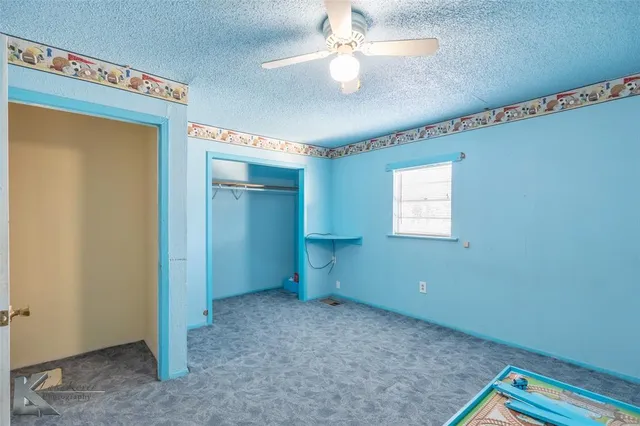 a bathroom with a sink mirror and shower