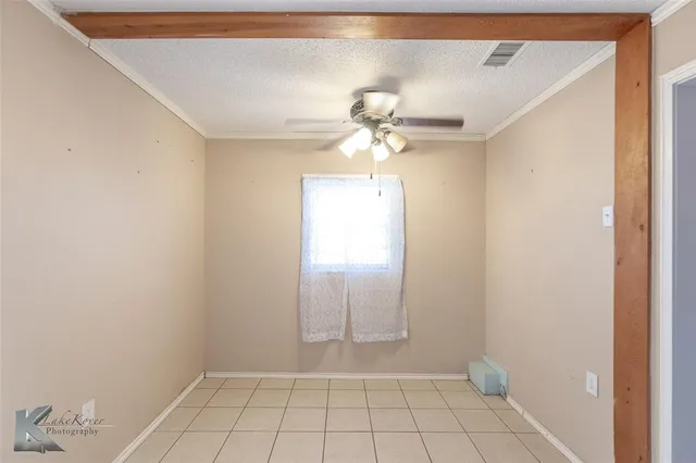 a room with stairs and a wooden table