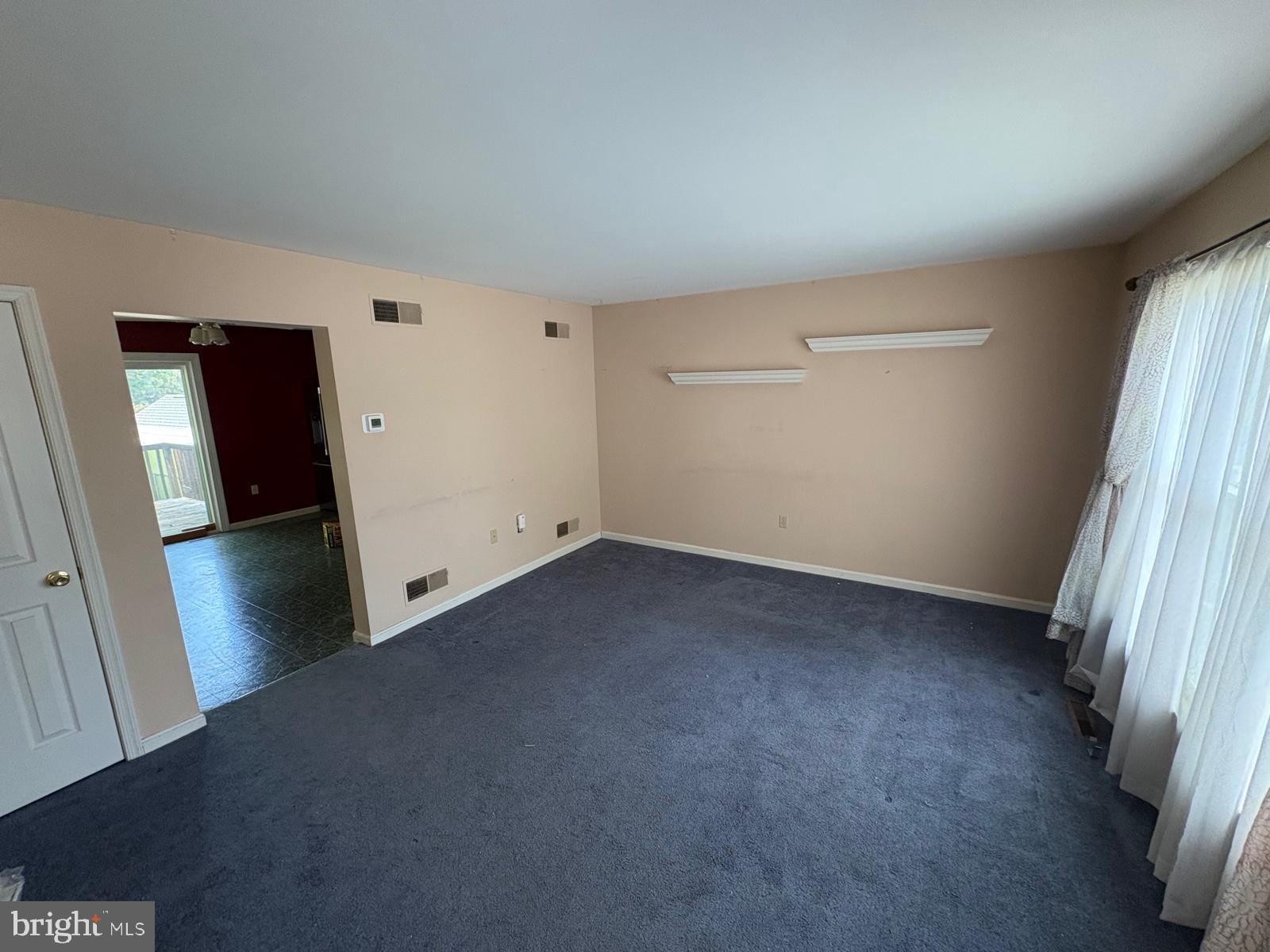 971 Monroe Street Steelton, PA 17113 - Photo 3 of 7 an empty room with windows