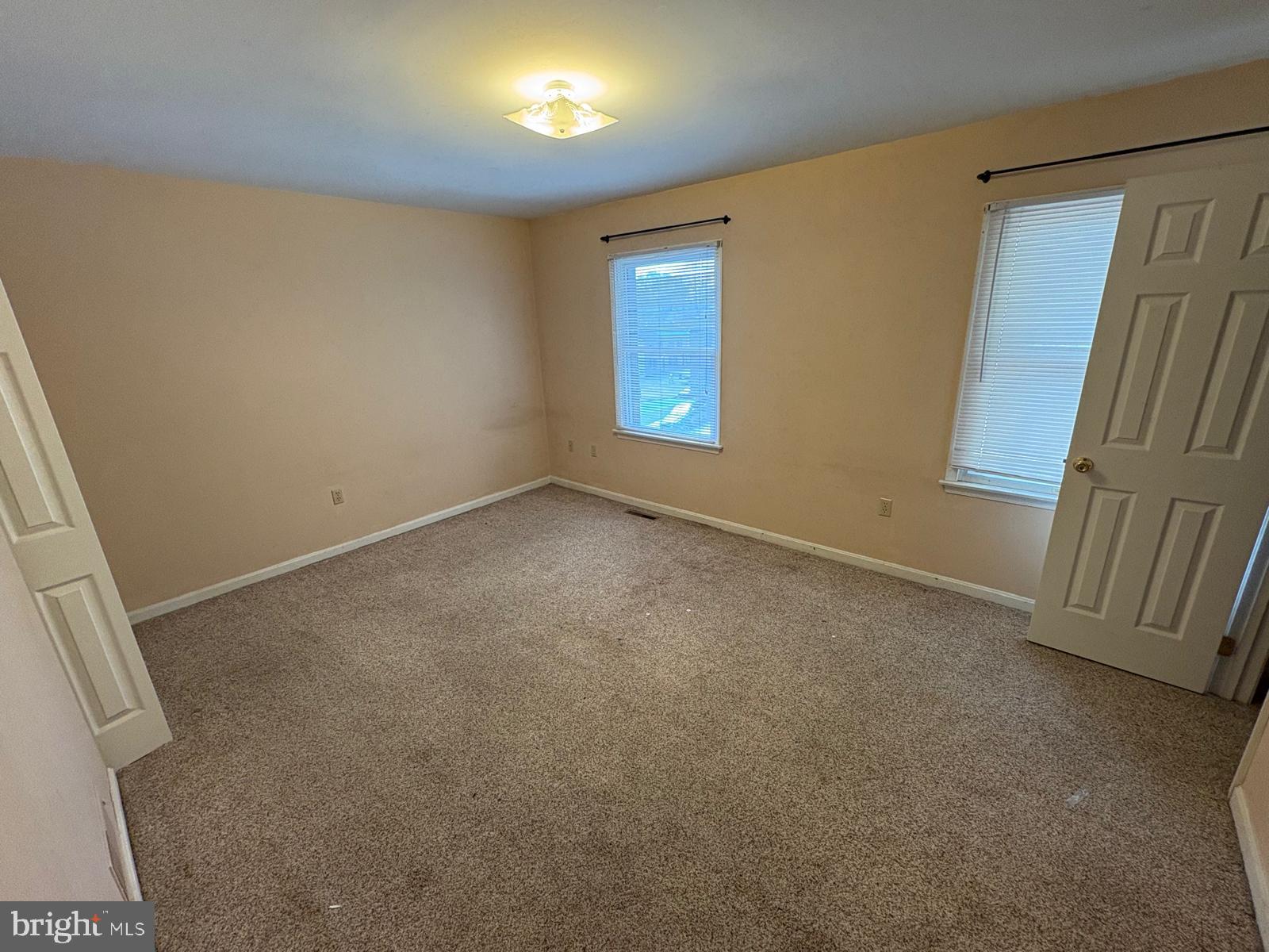 971 Monroe Street Steelton, PA 17113 - Photo 5 of 7 an empty room with windows