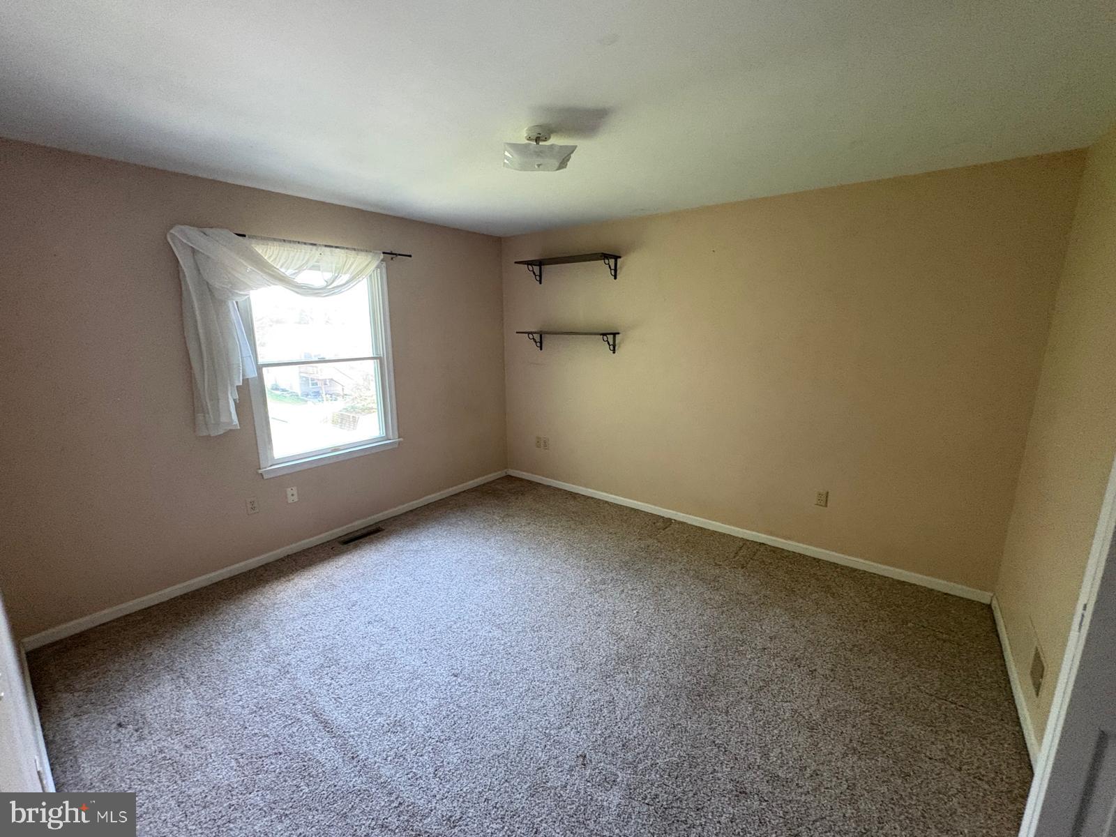 971 Monroe Street Steelton, PA 17113 - Photo 6 of 7 an empty room with a window