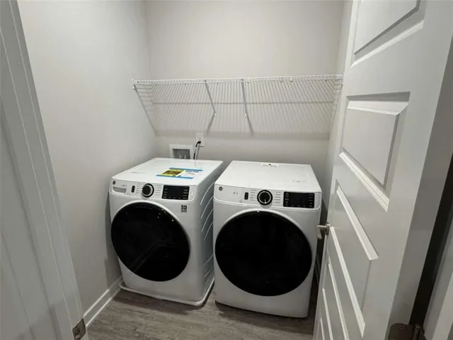 a utility room with dryer and washer