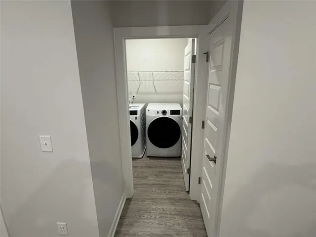 a view of a bathroom with a sink and a window