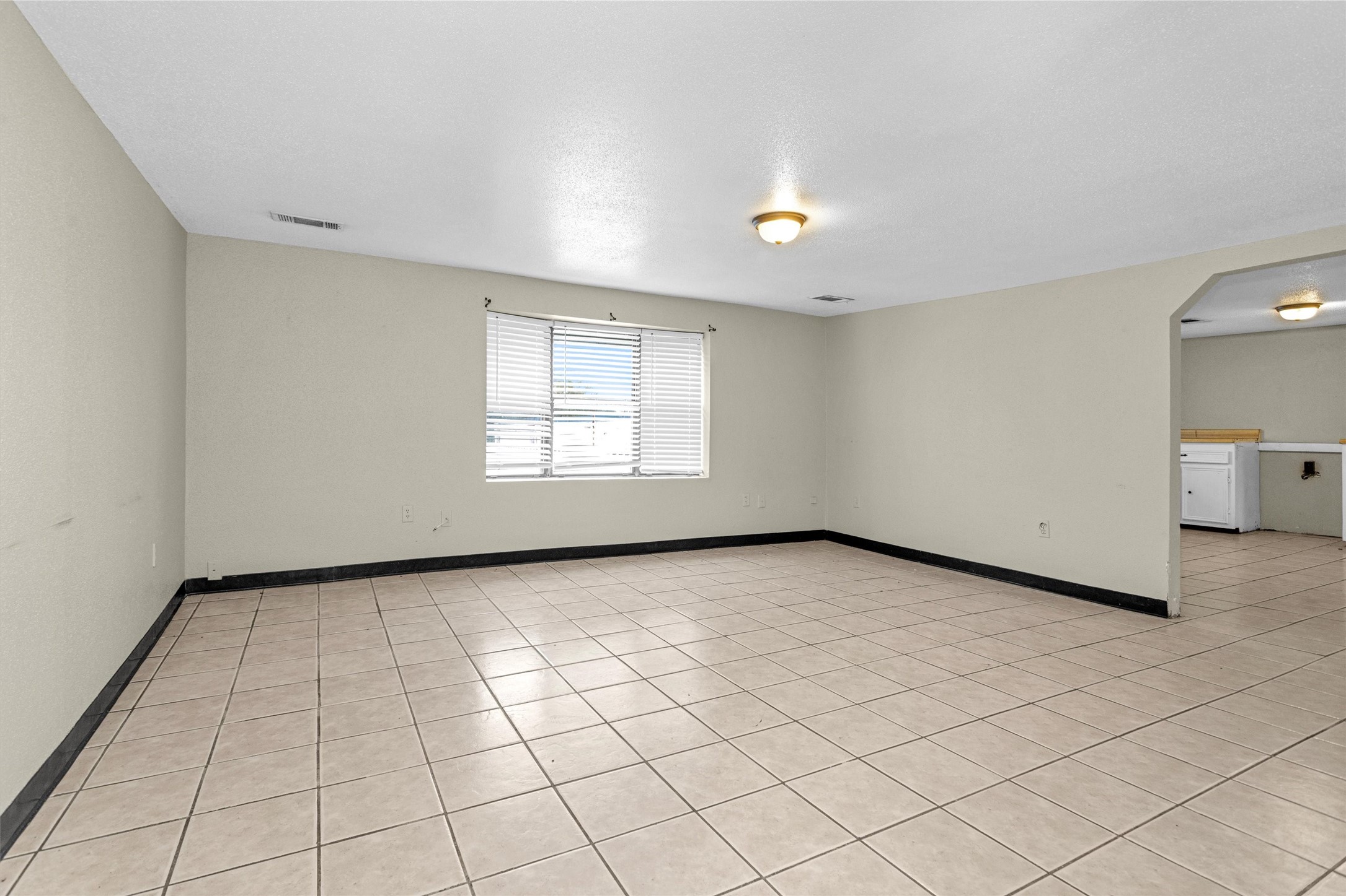 11031 Highway 150 Shepherd, TX 77371 - Photo 16 of 32 an empty room with windows