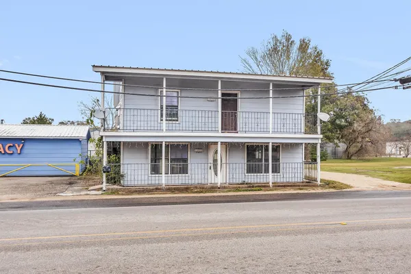 front view of a house with a street