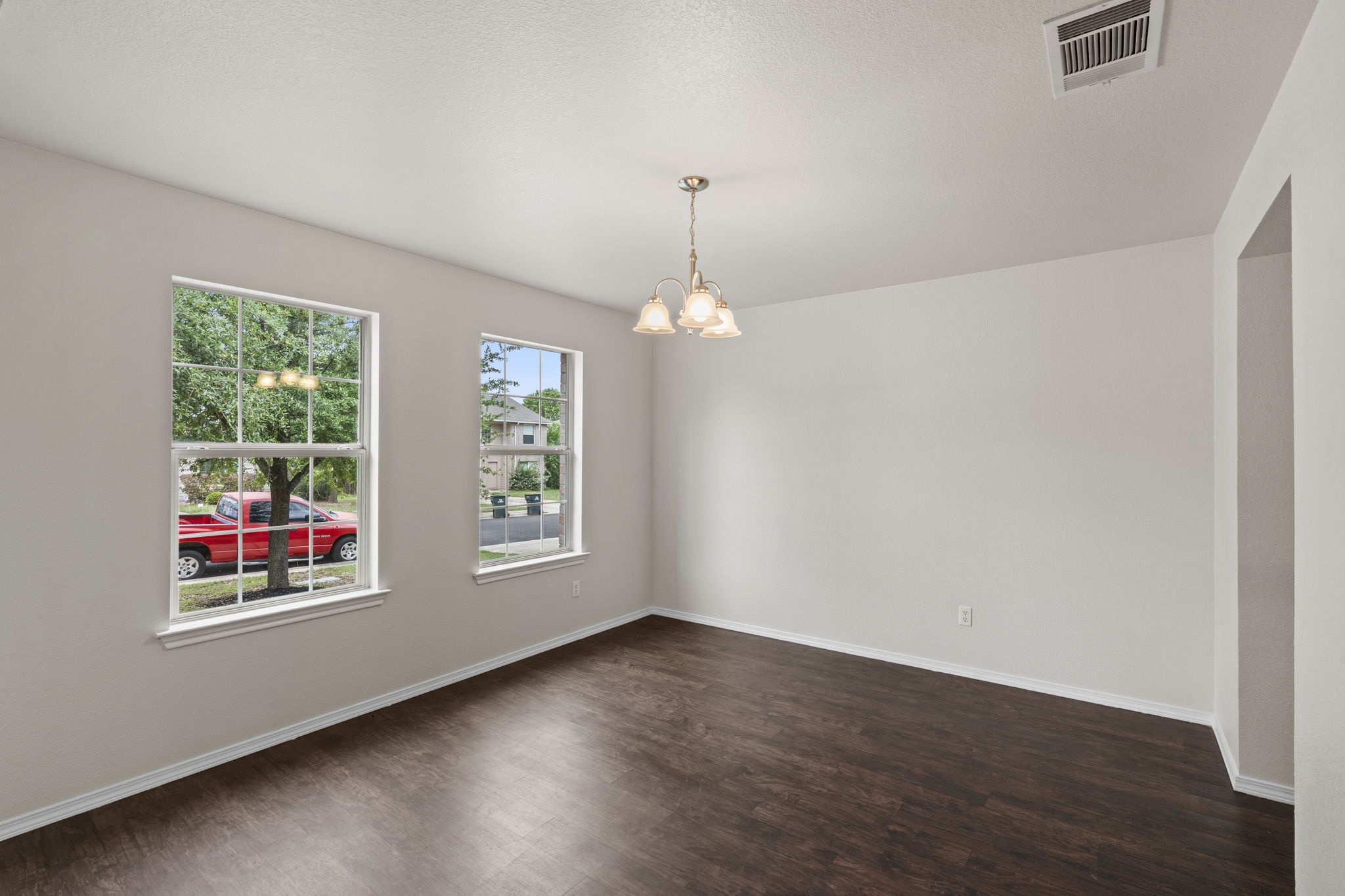208 Dandelion Loop Kyle, TX 78640 - Photo 10 of 39 Dining room with natural light off the entry