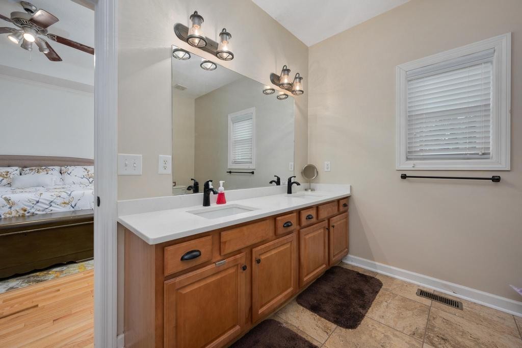 211 Oak Hollow Road Manchester, TN 37355 - Photo 15 of 31 a bathroom with a sink and a mirror