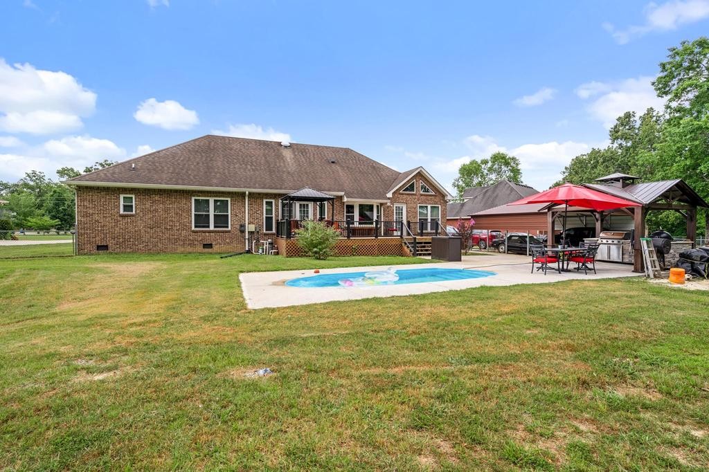 211 Oak Hollow Road Manchester, TN 37355 - Photo 27 of 31 a front view of a house with swimming pool