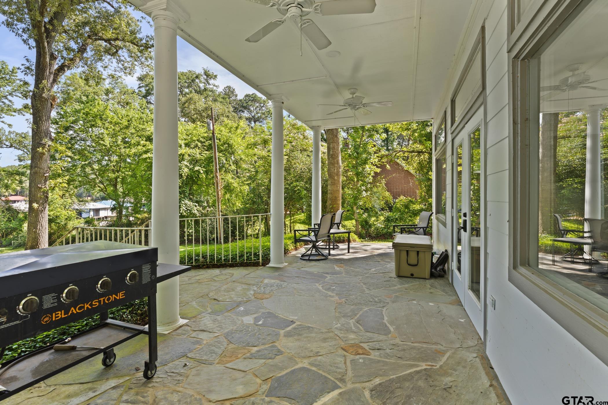 18630 Eastside Road Troup, TX 75789 - Photo 7 of 47 a view of a room with furniture and large windows