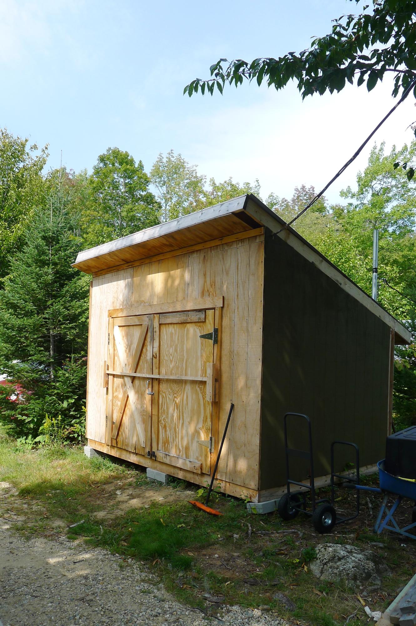 Lot 11 Basin Road Carthage, ME 04224 - Photo 31 of 43 This shed houses the batteries & tools
