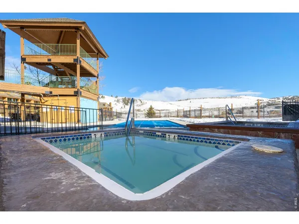 a view of a house with a swimming pool