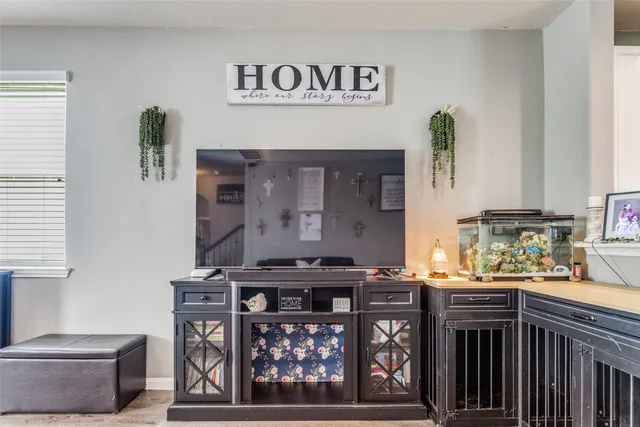 a kitchen with stainless steel appliances granite countertop a stove and cabinets