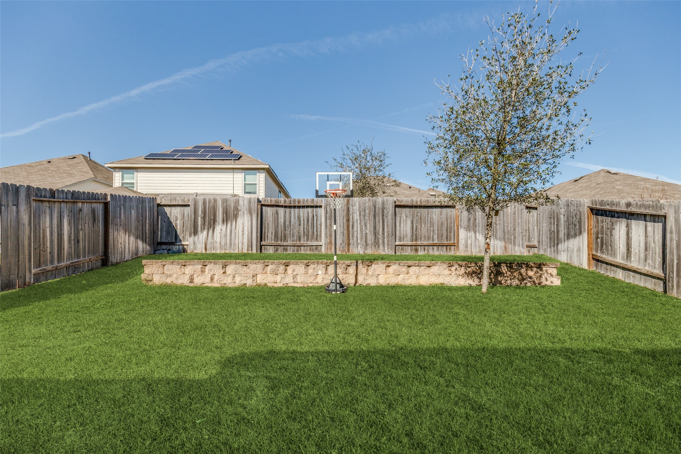 3633 Cub Drive Conroe, TX 77301 - Photo 25 of 30 a view of a house with a yard and sitting area