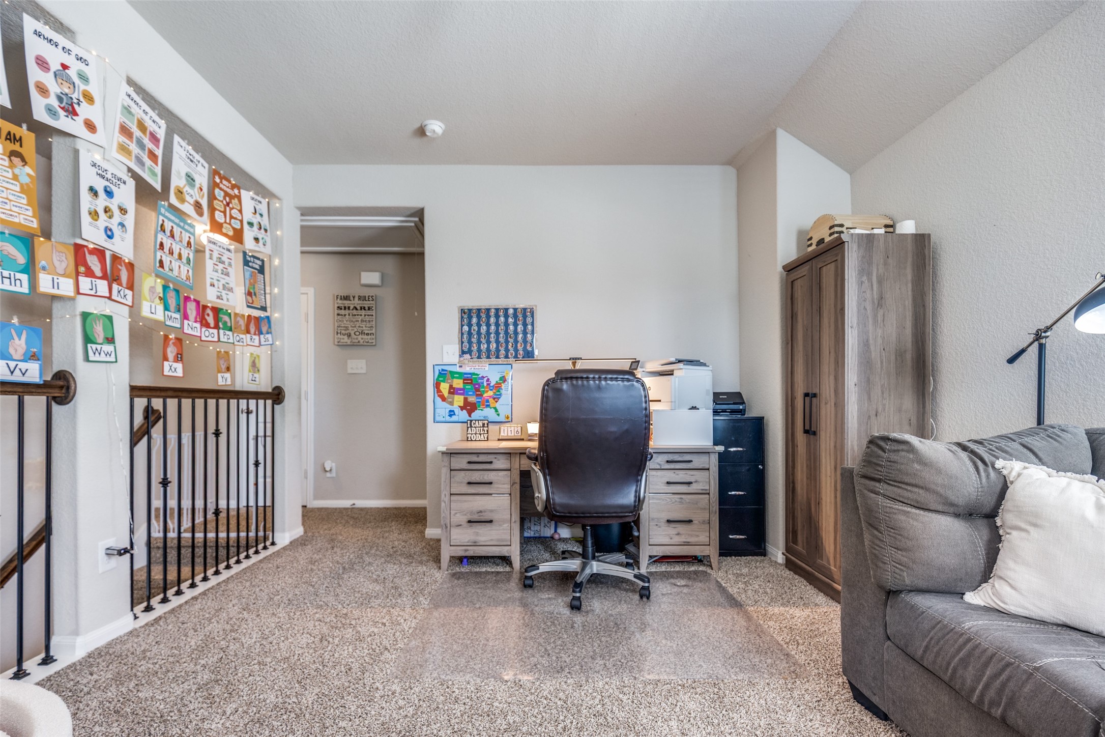 3633 Cub Drive Conroe, TX 77301 - Photo 9 of 30 a view of a livingroom with workspace and a couch
