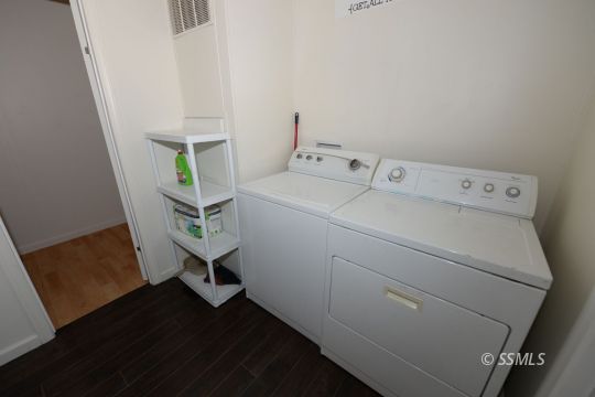 208 Charity Road Caliente, CA 93518 - Photo 16 of 47 a utility room with dryer and washer