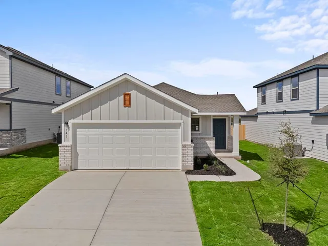 a front view of house with yard