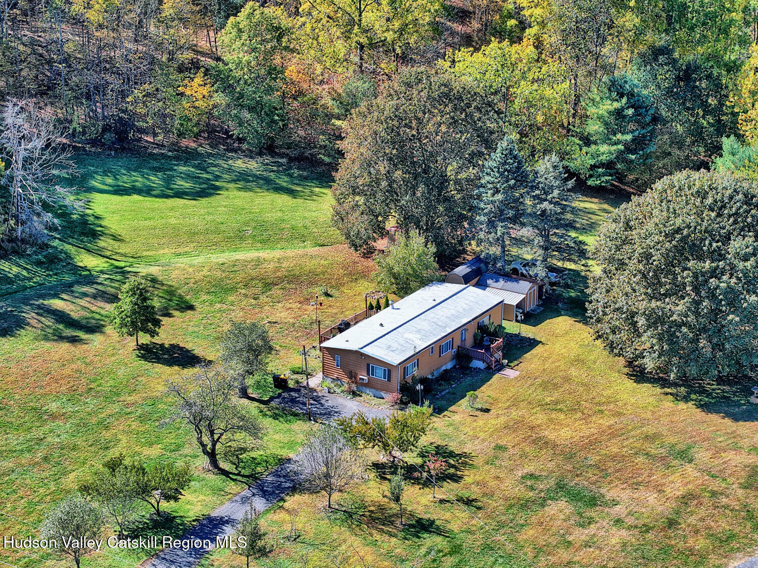 626 Bross Street Cairo, NY 12413 - Photo 65 of 78 an aerial view of a house with a yard and large trees