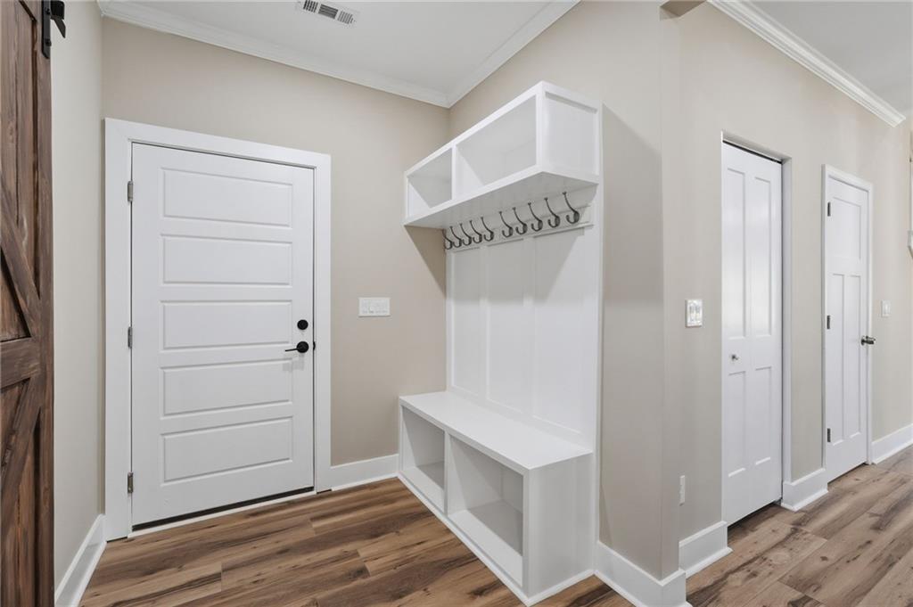 2322 Rockbridge Road Southwest Stone Mountain, GA 30087 - Photo 39 of 46 a view of an entryway with wooden floor