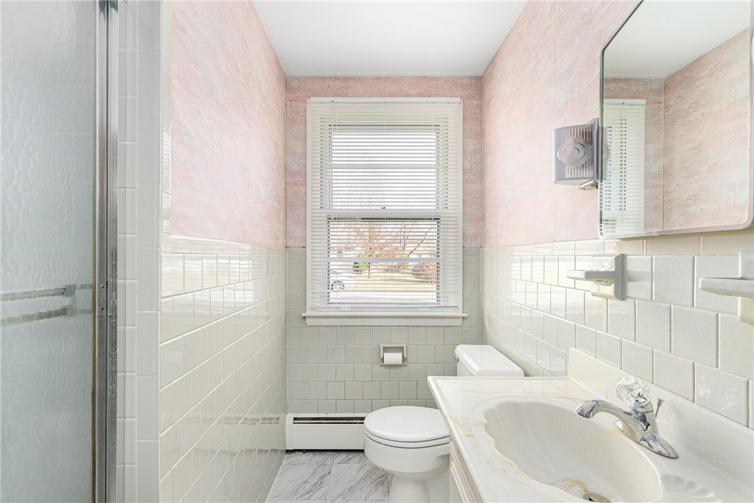 15 Killdeer Road Warwick, RI 02888 - Photo 21 of 29 Full bathroom with tile tub/shower