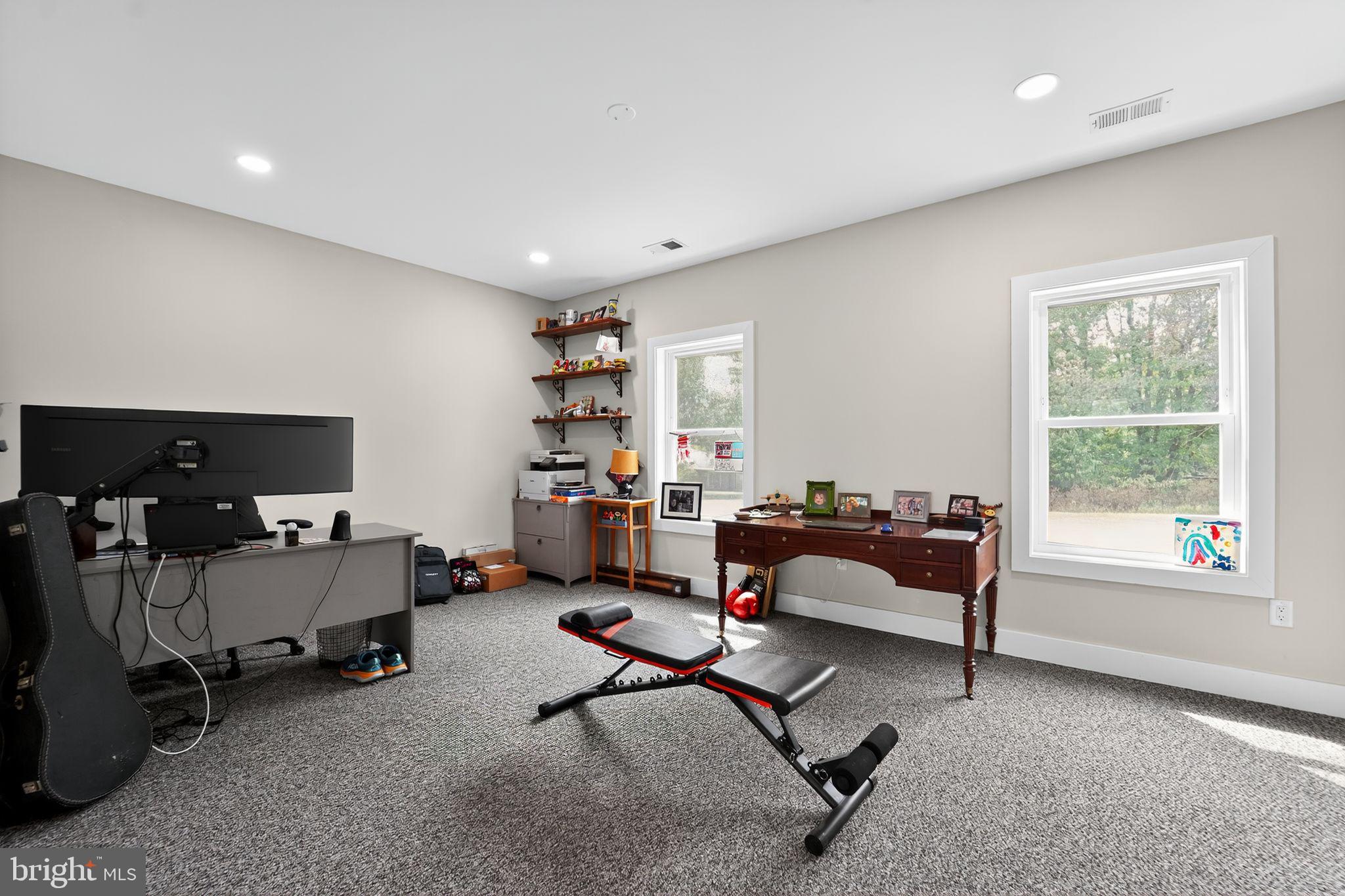 8305 Biggs Ford Road Walkersville, MD 21793 - Photo 12 of 38 a living room with furniture and a window