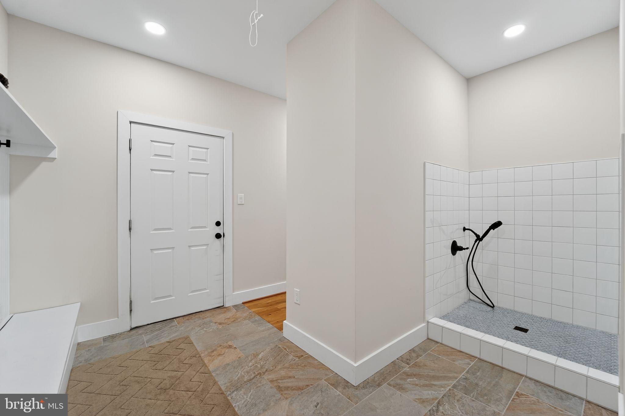 8305 Biggs Ford Road Walkersville, MD 21793 - Photo 15 of 38 a bathroom with a shower