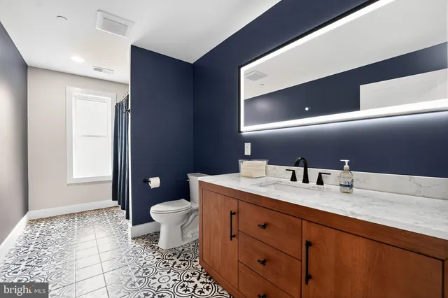 a room with furniture and wooden floor