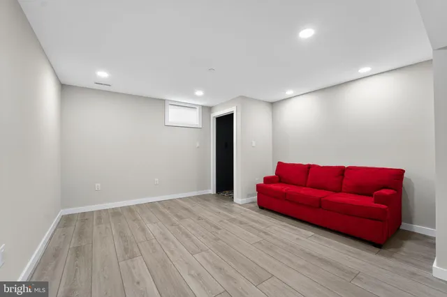 a bathroom with a sink and a window