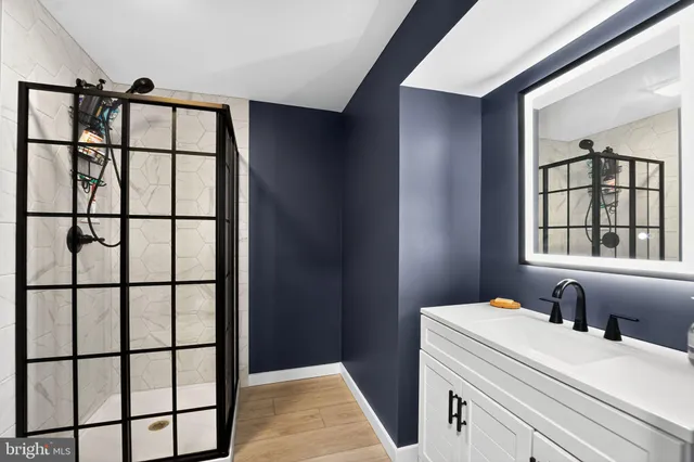 a view of a room with furniture and lamp