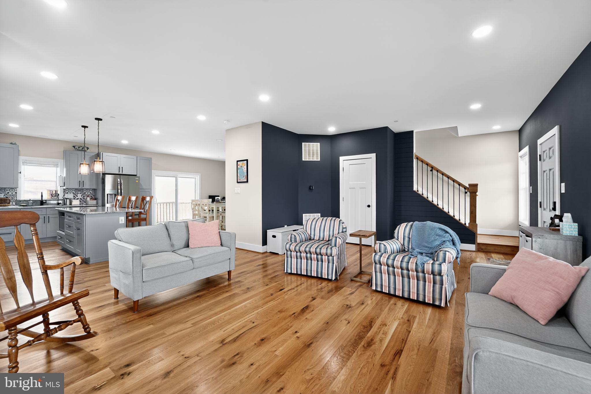 8305 Biggs Ford Road Walkersville, MD 21793 - Photo 4 of 38 a living room with furniture and a view of kitchen
